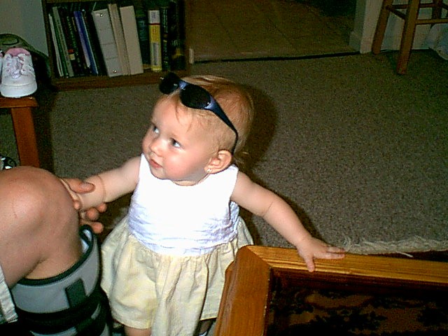 Sunglasses on her head